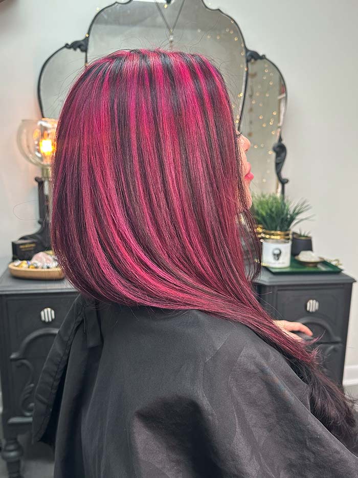 Pink highlights on black hair